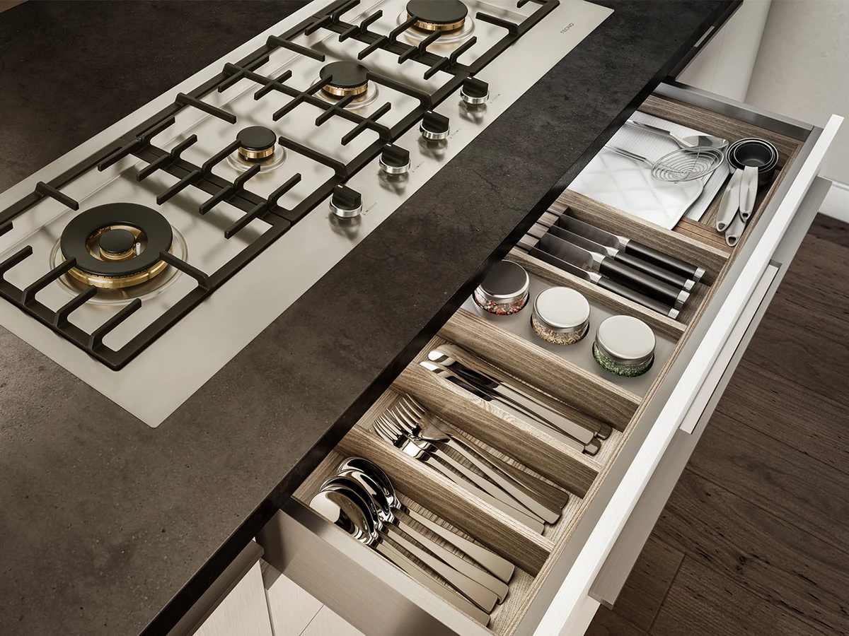 Cooktop Tecno instalado sobre gaveteiro